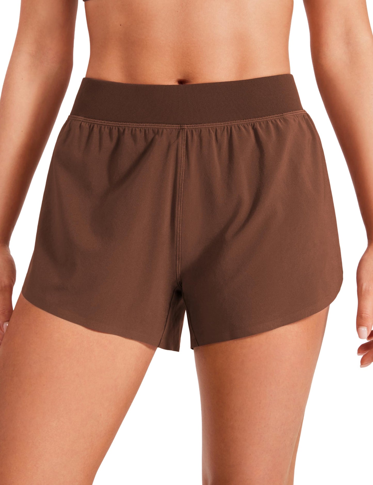 CRZ YOGA Mid Waisted Dolphin Athletic Shorts for Women Lightweight High Split Gym Workout Shorts with Liner Quick Dry Coffee Brown XX-Small